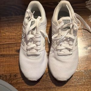 New Balance size 7. Only worn a few times. Coffee stain, will clean before ship